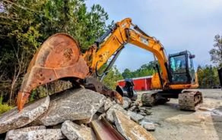 Sany excavator with bucket of rocks